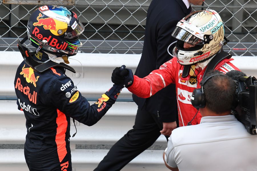 Sebastian Vettel and Daniel Ricciardo celebrate in parc ferme