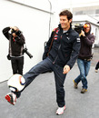 Mark Webber shows off his football skills in the Montreal paddock
