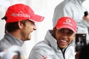 Jenson Button and Lewis Hamilton share a joke