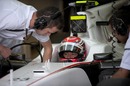 Sauber driver Kamui Kobayashi in the pits