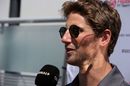 Romain Grosjean talks with media