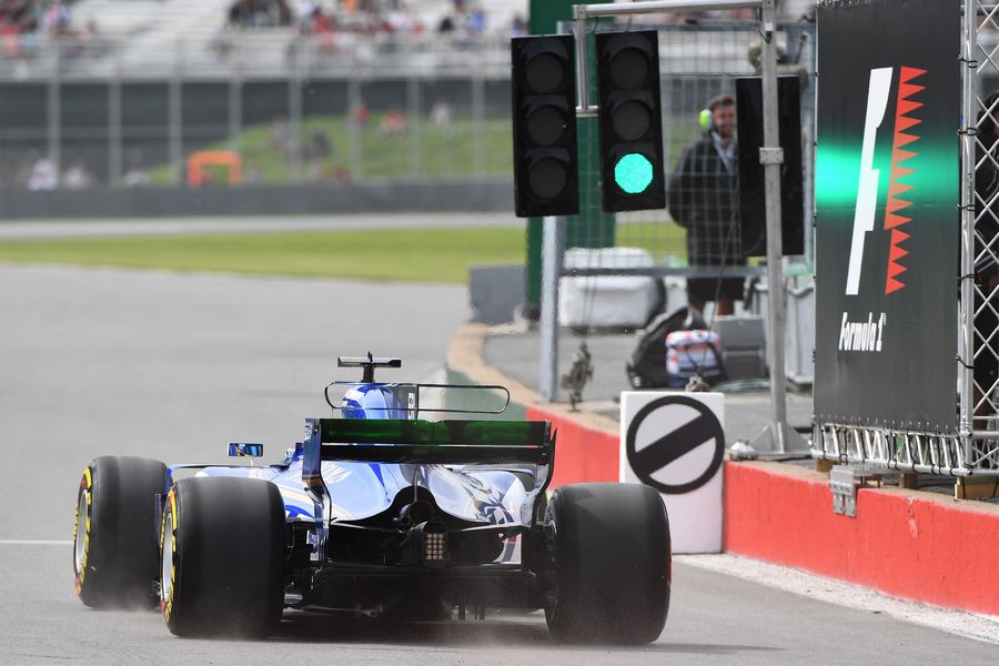 Marcus Ericsson heads down the pit lane in the Sauber