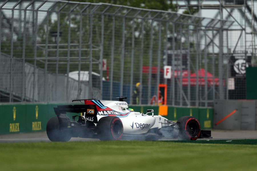 Felipe Massa locks up tire