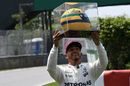 Lewis Hamilton presented with race-worn Ayrton Senna helmet after Canada pole