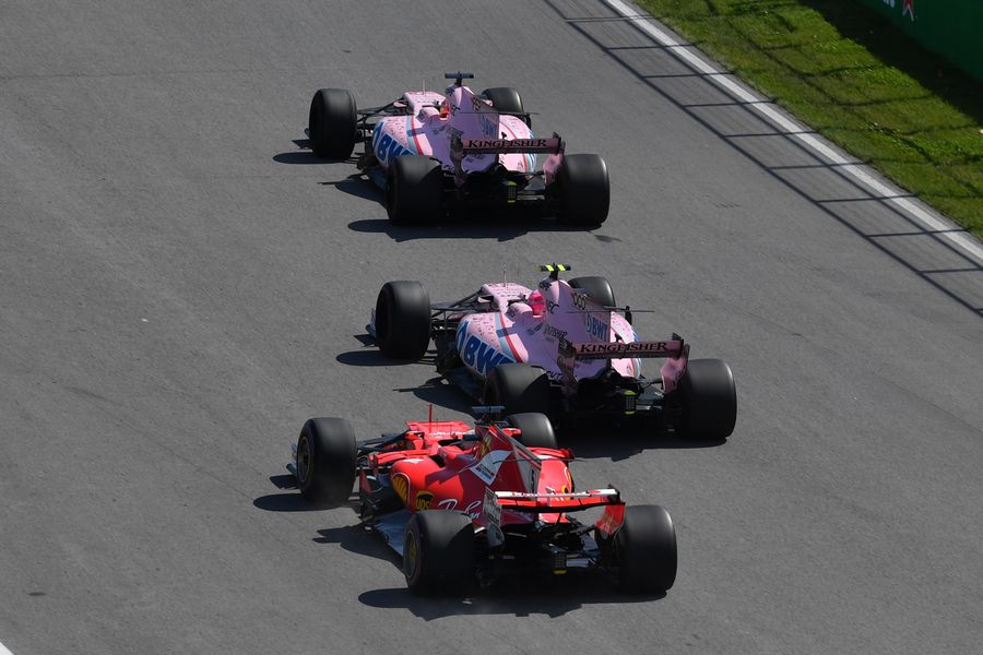 Sergio Perez, Esteban Ocon and Sebastian Vettel battle