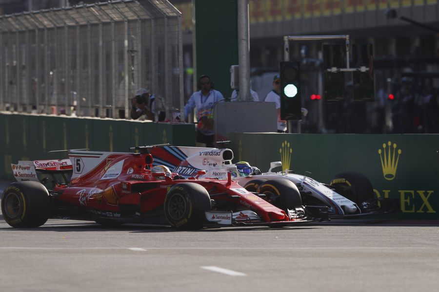 Felipe Massa and Sebastian Vettel battle