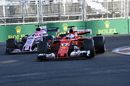Sebastian Vettel and Esteban Ocon battle