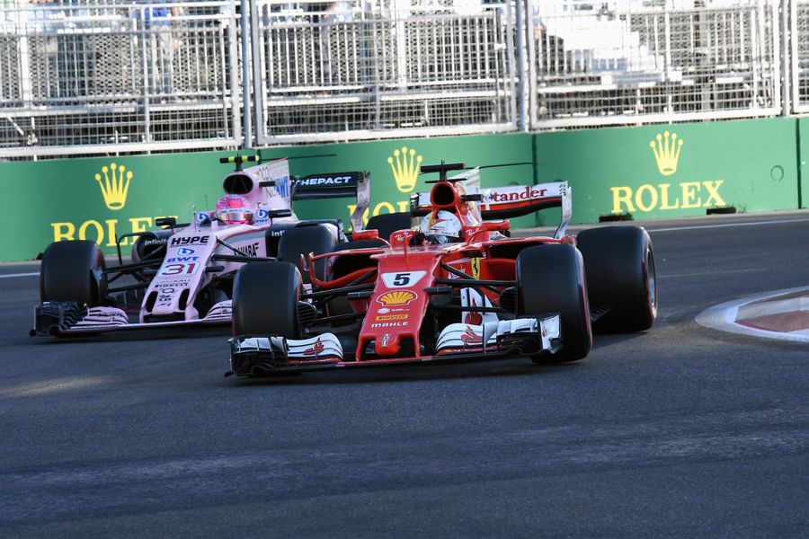 Sebastian Vettel and Esteban Ocon battle