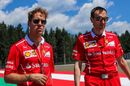 Sebastian Vettel walks the track with Riccardo Adami