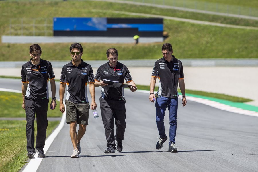 Sergio Perez walks the track