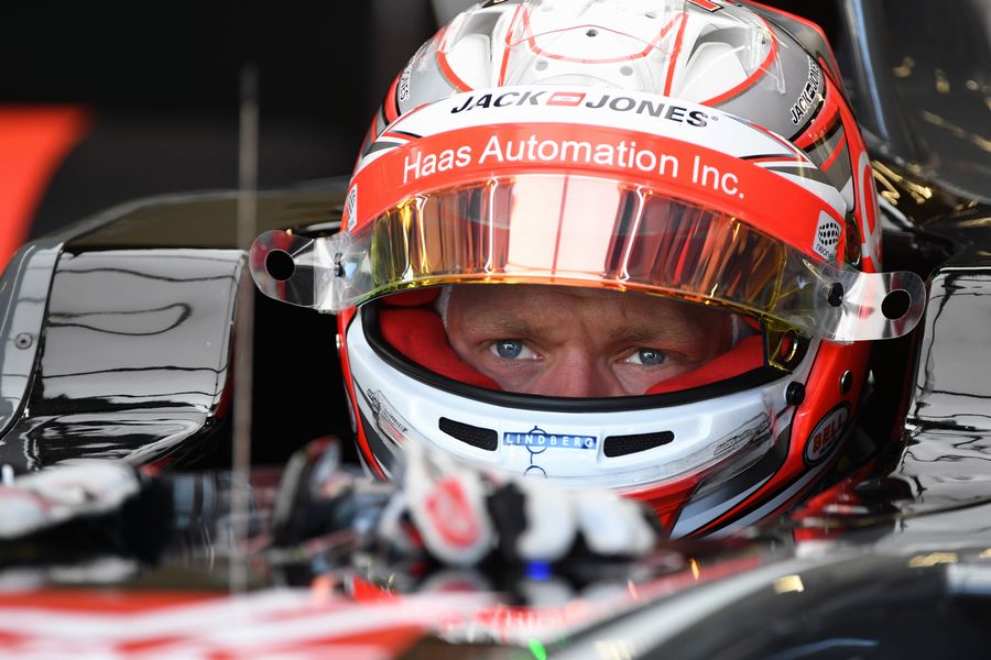 Kevin Magnussen looks on from the Haas cockpit