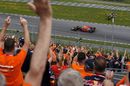 Max Verstappen passes his fans in the grandstand