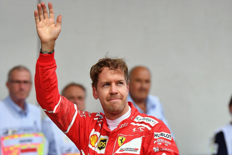 Sebastian Vettel celebrates in parc ferme