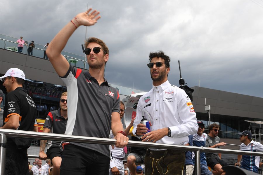 Daniel Ricciardo and Romain Grosjean enjoy the drivers parade