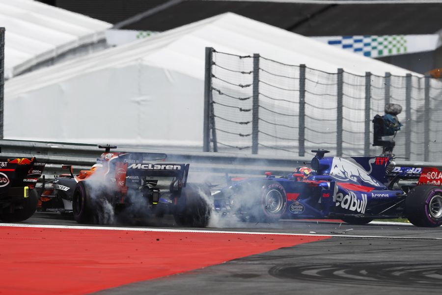 Fernando Alonso and Daniil Kvyat collide at the start of the race