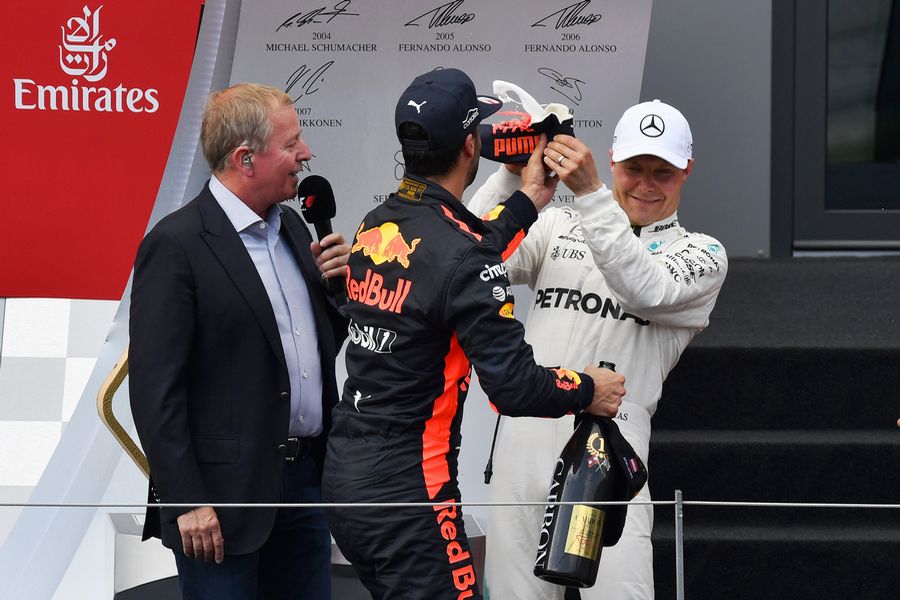 Daniel Ricciardo and Valtteri Bottas celebrate on the podium