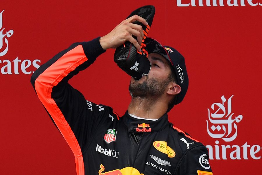 Daniel Ricciardo shoey on the podium