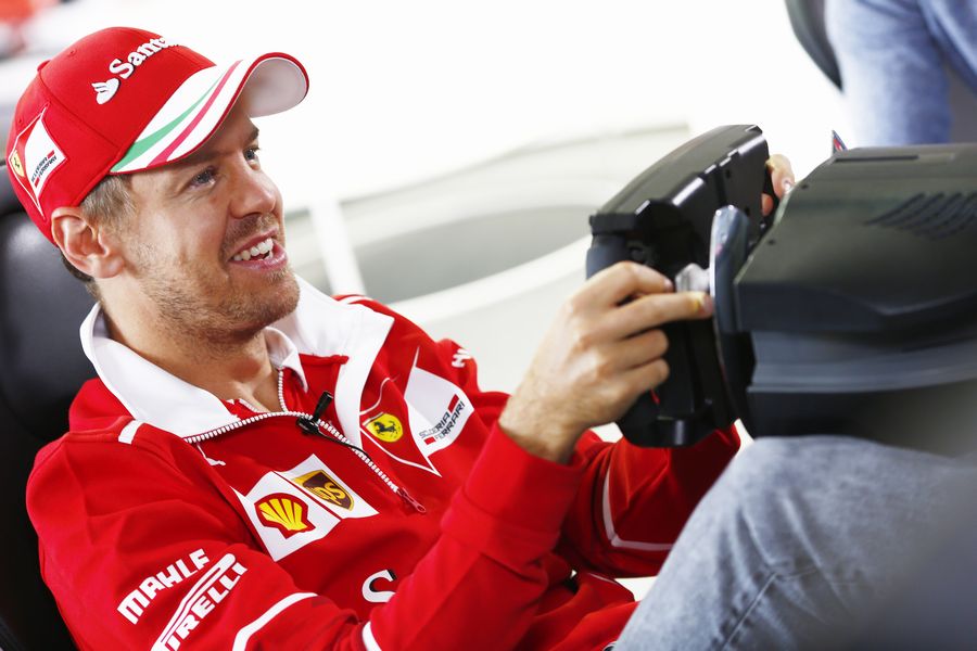 Sebastian Vettel plays a simulator