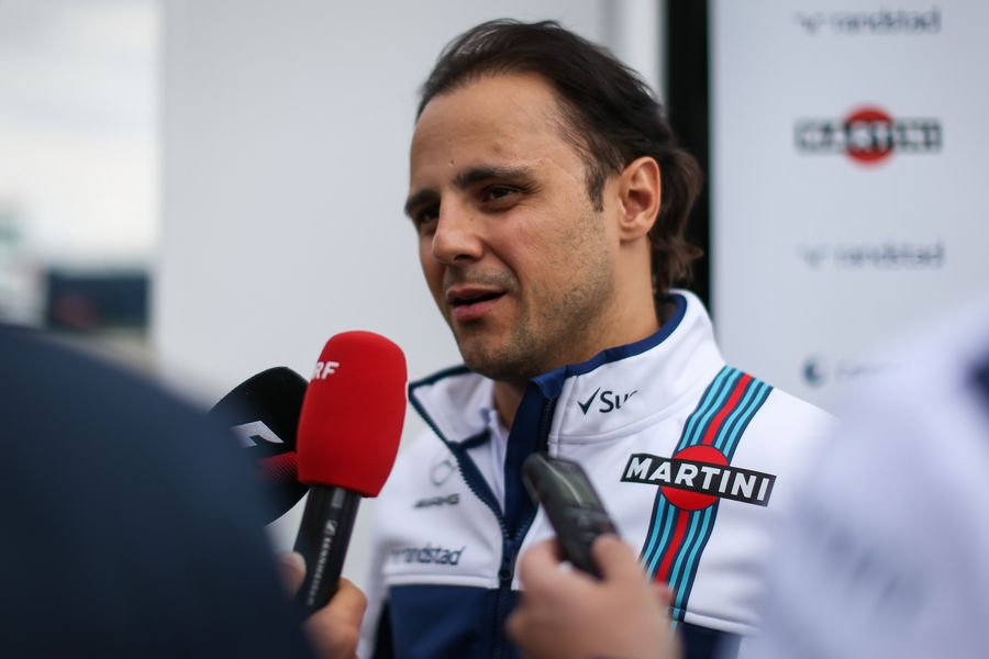 Felipe Massa talks to the media