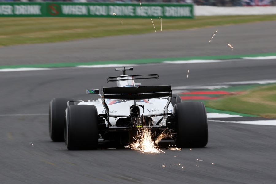 Sparks fly from Felipe Massa's Williams