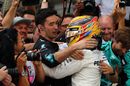 Lewis Hamilton cerebrates with Mercedes