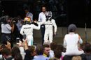 Race winner Lewis Hamilton celebrates in parc ferme with Valtteri Bottas