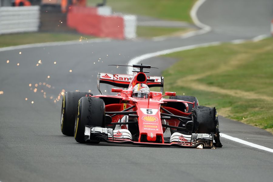 Sebastian Vettel with front delaminating tyre