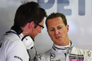 Michael Schumacher explains his problems to race engineer Andy Shovlin