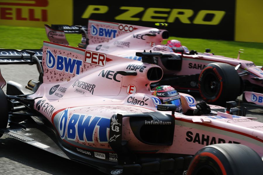 Sergio Perez and Esteban Ocon battle