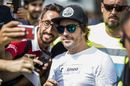 Fernando Alonso poses for a selfie photo with the fans