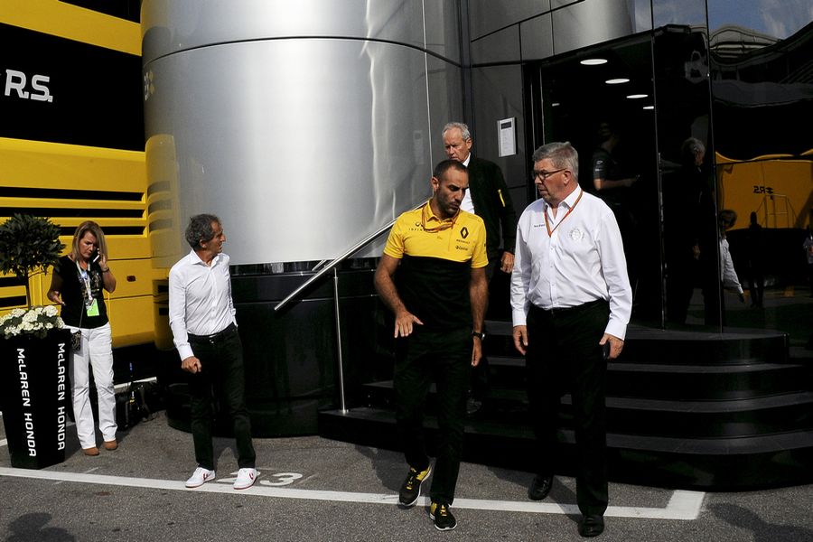 Jerome Stoll, Alain Prost, Cyril Abiteboul and Ross Brawn of Motorsports at the McLaren motorhome