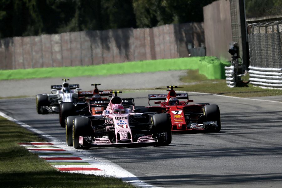 Kimi Raikkonen battles for position with Esteban Ocon