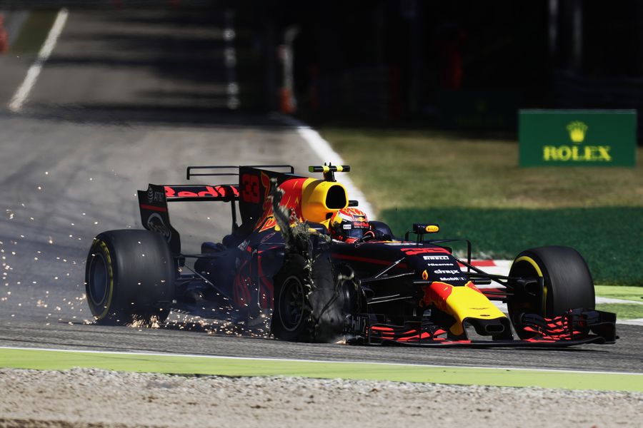 Max Verstappen with front puncture damage
