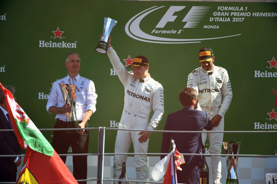 Valtteri Bottas and Lewis Hamilton celebrate on the podium