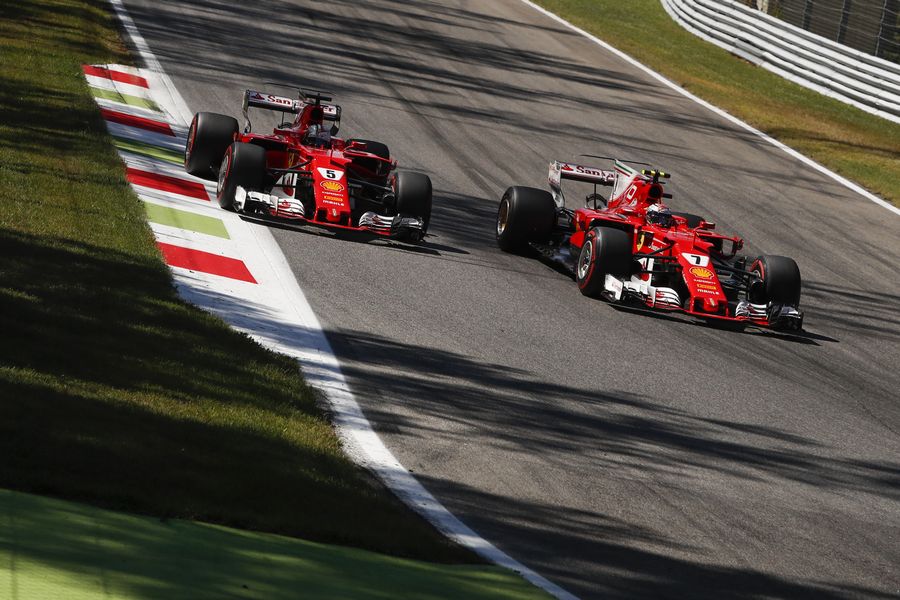 Sebastian Vettel and Kimi Raikkonen battle