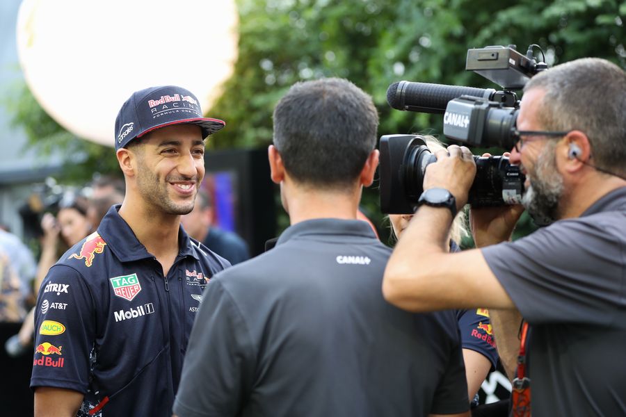 Daniel Ricciardo talks to the media
