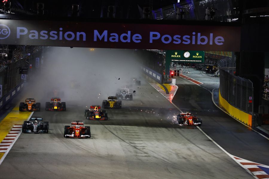 Kimi Raikkonen and Max Verstappen crash at the start of the race