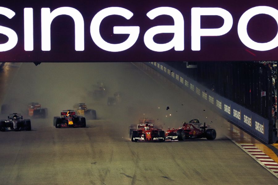 Sebastian Vettel leads at the start of the race and the cars of Kimi Raikkonen and Max Verstappen crash after colliding
