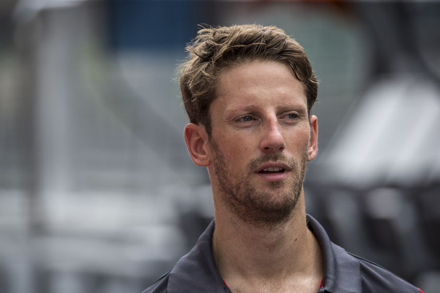 Romain Grosjean walks the pit lane