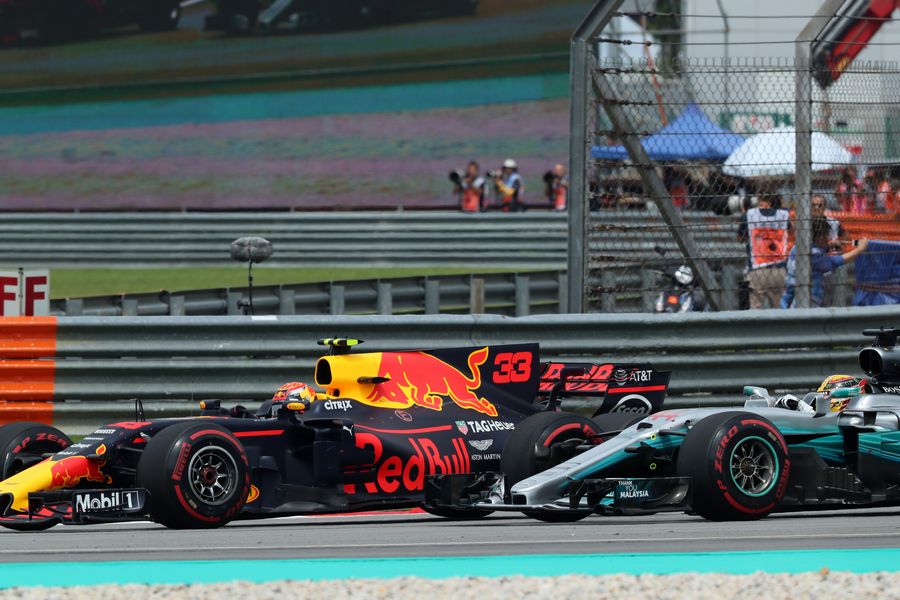 Max Verstappen and Lewis Hamilton battle