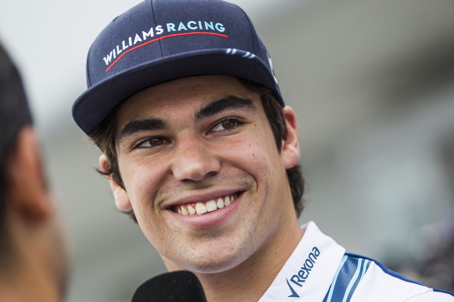 Lance Stroll looks relaxed in the paddock