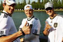 Adrian Sutil, Nico Rosberg and Michael Schumacher get into the spirit of the World Cup
