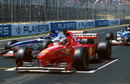 Race winner Michael Schumacher parks on the grid after the race is stopped due to Olivier Panis's accident
