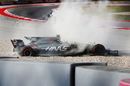 Romain Grosjean spins into the gravel in FP3