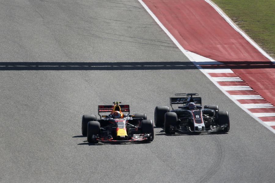 Max Verstappen and Romain Grosjean battle