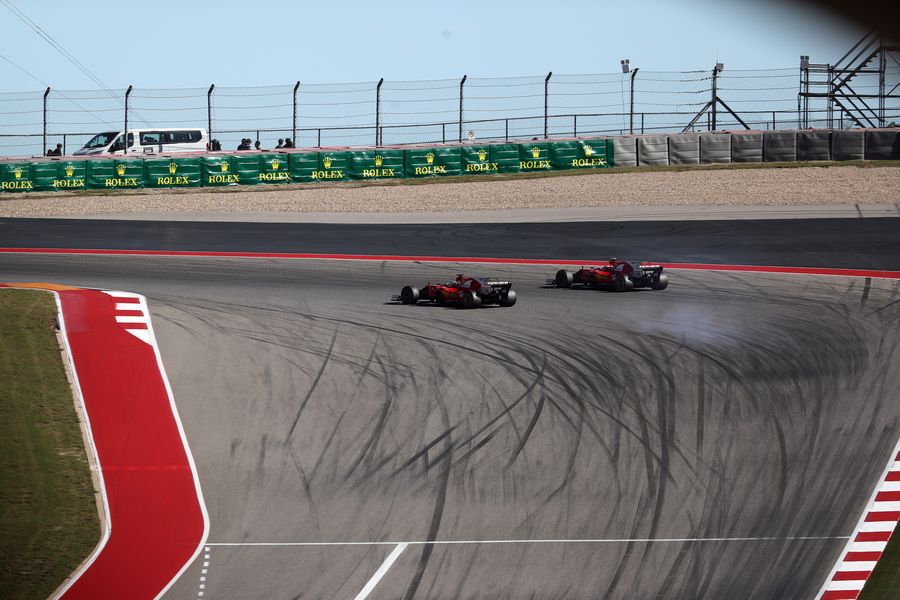 Sebastian Vettel and Kimi Raikkonen on track in the Ferrari