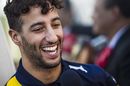 Daniel Ricciardo looks relaxed in the paddock