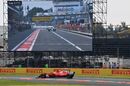 Sebastian Vettel on lap 2 and Lewis Hamilton in pit lane on the screen