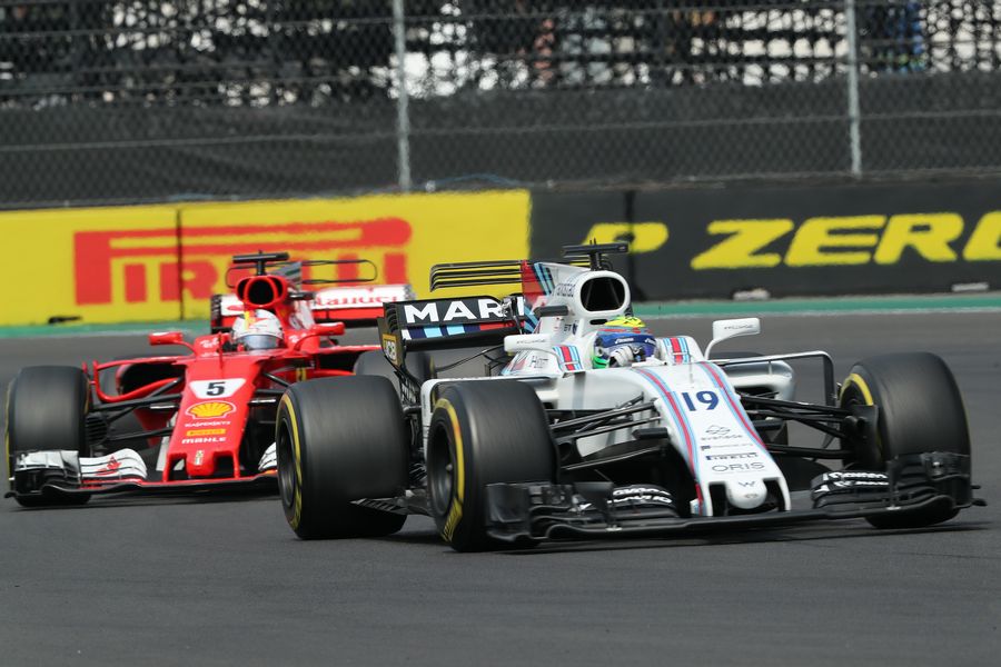 Felipe Massa and Sebastian Vettel battle