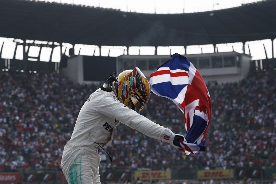 World Champion Lewis Hamilton celebrate